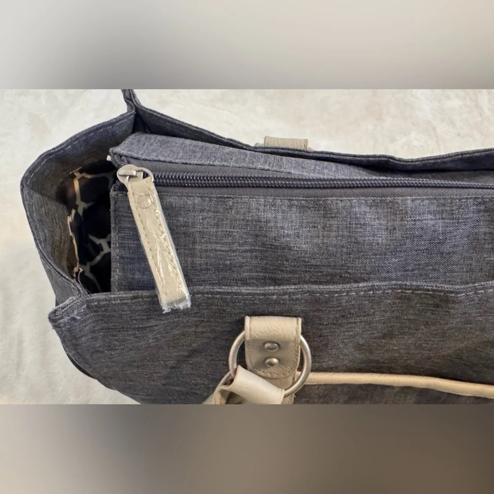 Bananafish Diaper Bag.  New Condition/ Never used.  Light navy and taupe/tan.